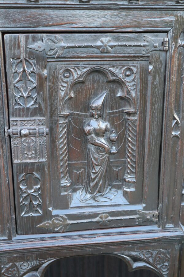 Late 19thC French gothic revival oak cabinet.