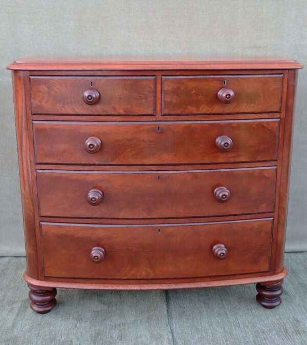 Early Victorian flame mahogany bow fronted chest of drawers