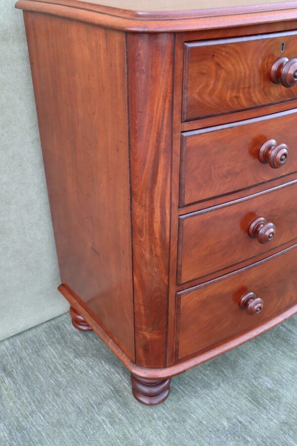 Early Victorian flame mahogany bow fronted chest of drawers